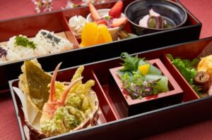Japanese cuisine displayed in a box