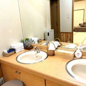 Men's washroom and amenities in the family waiting room at Komorebi Funeral Home